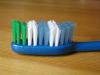 Olcsó Colgate Deluxe toothbrush *Simple* (IT7150)